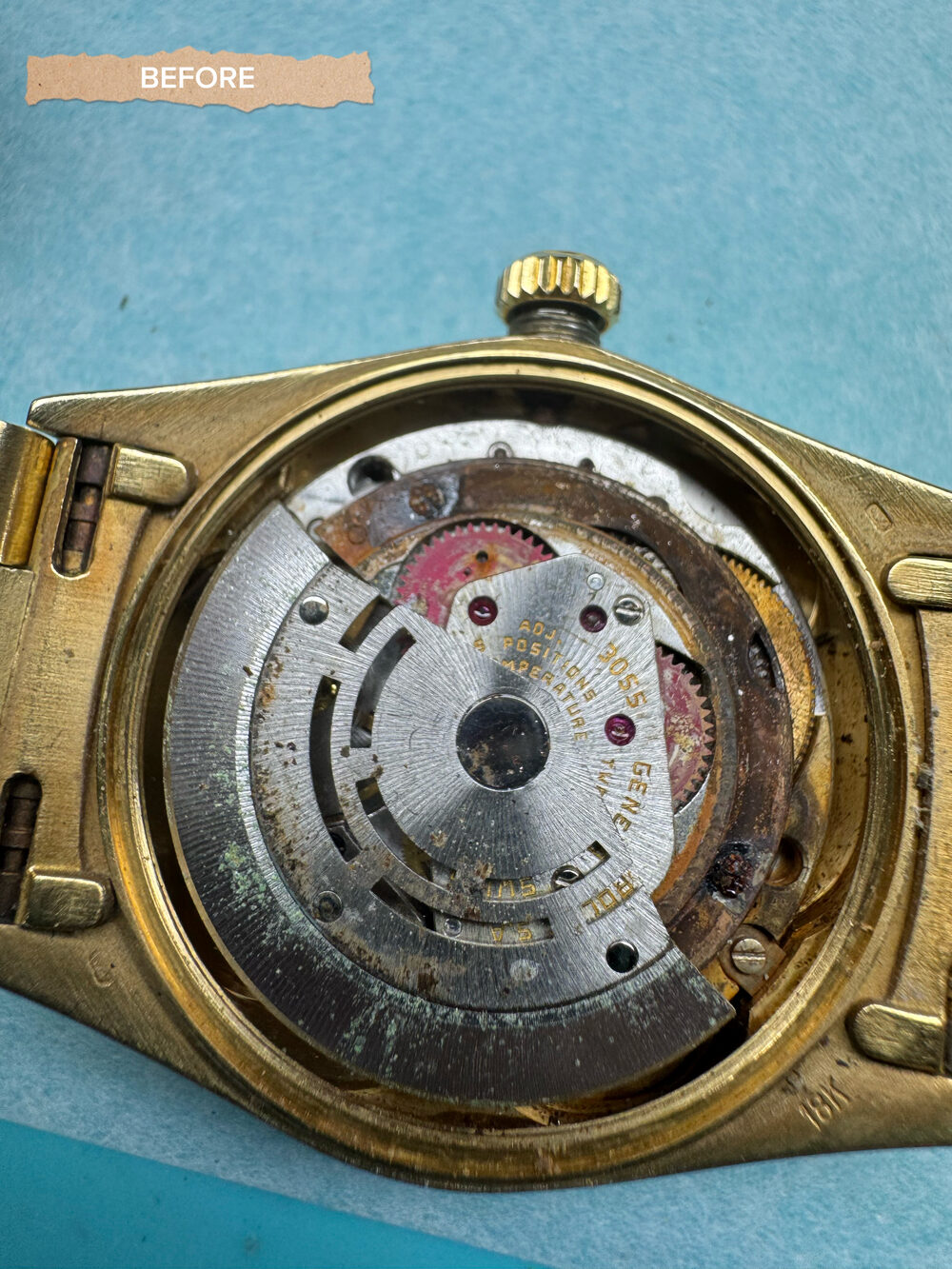 Corroded gold Rolex movement before service
