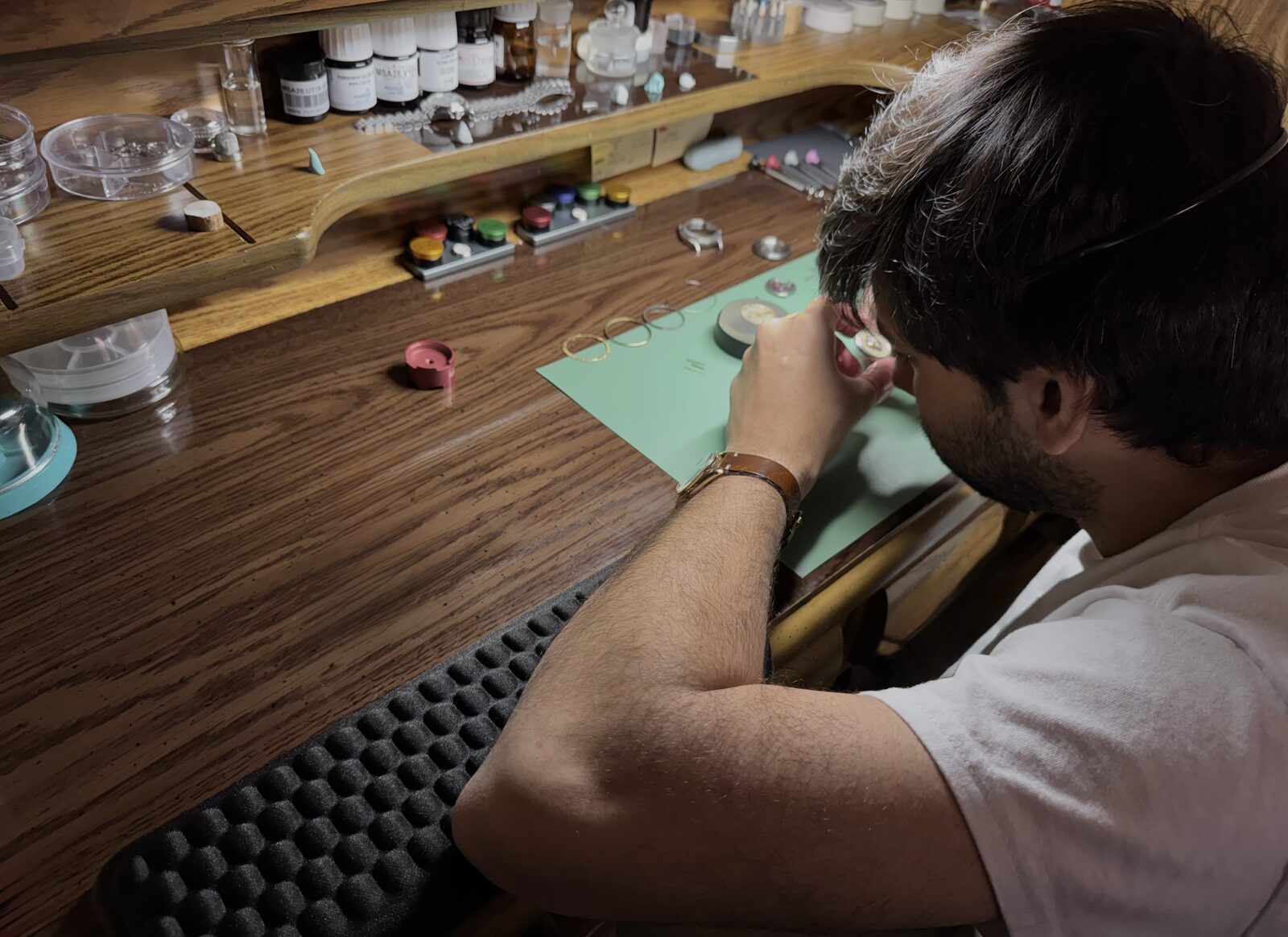 Antonio 'Tony Jr.' at his watchmaker's bench in Cape Coral